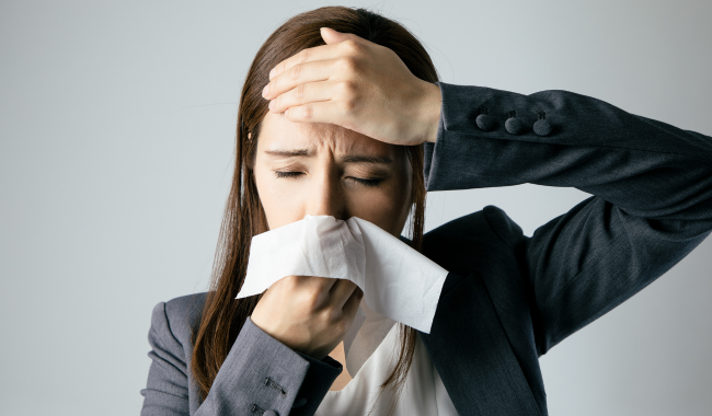 Businesswoman in need of salt therapy for rhinitis in Winter Haven FL