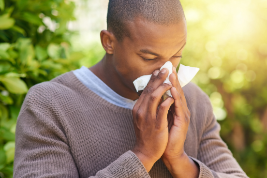 Man with runny nose in need of salt room therapy for sinusitis in Winter Haven FL